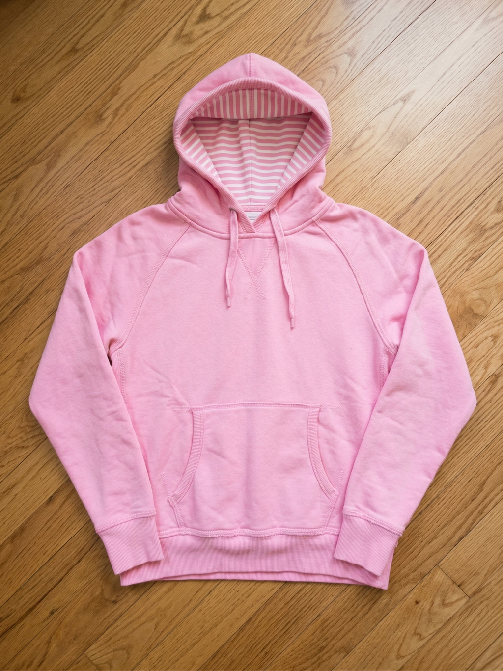 The Essential Cozy Pink Fleece Hoodie with Sweet Striped Hood Lining
