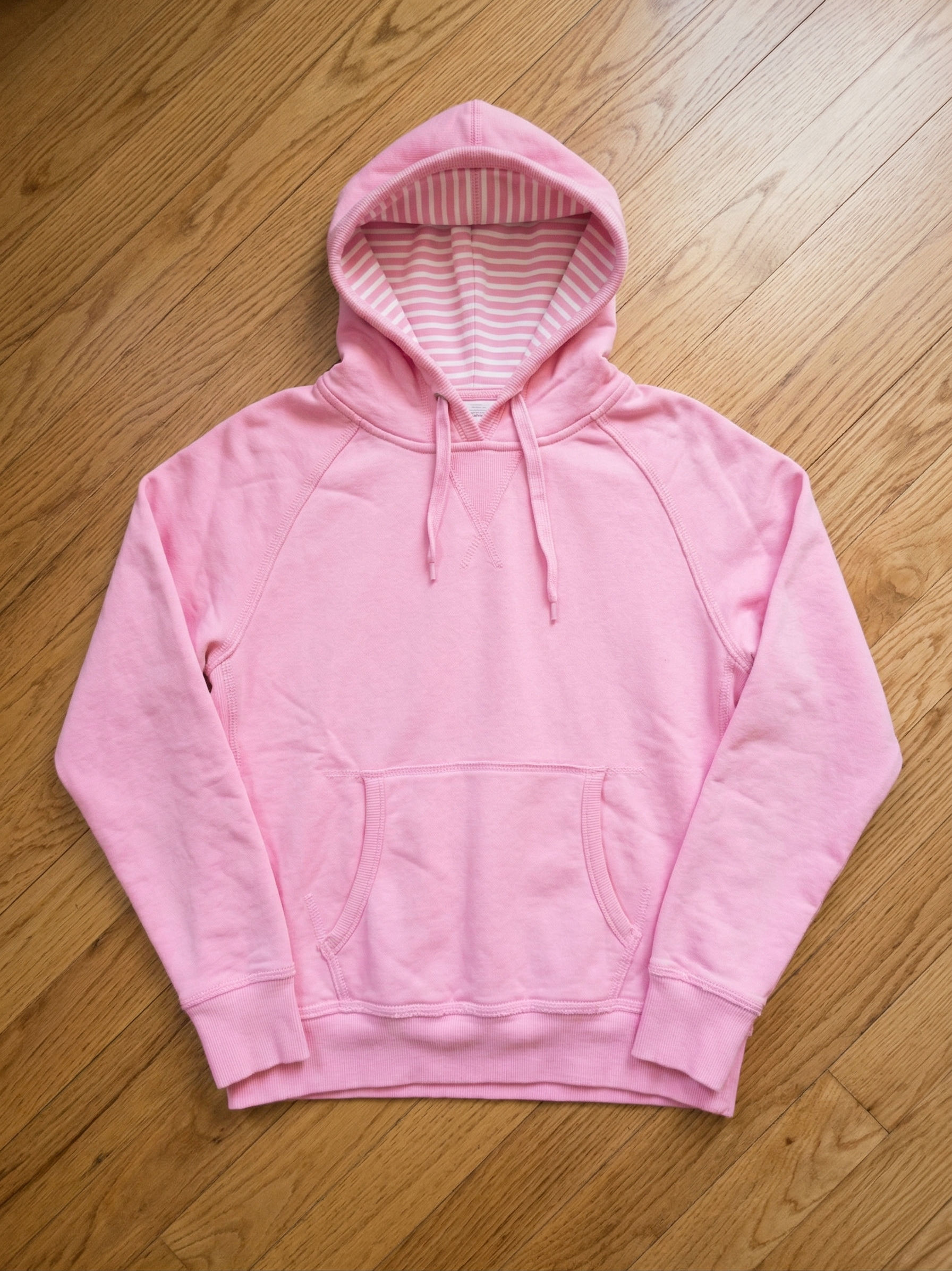 The Essential Cozy Pink Fleece Hoodie with Sweet Striped Hood Lining